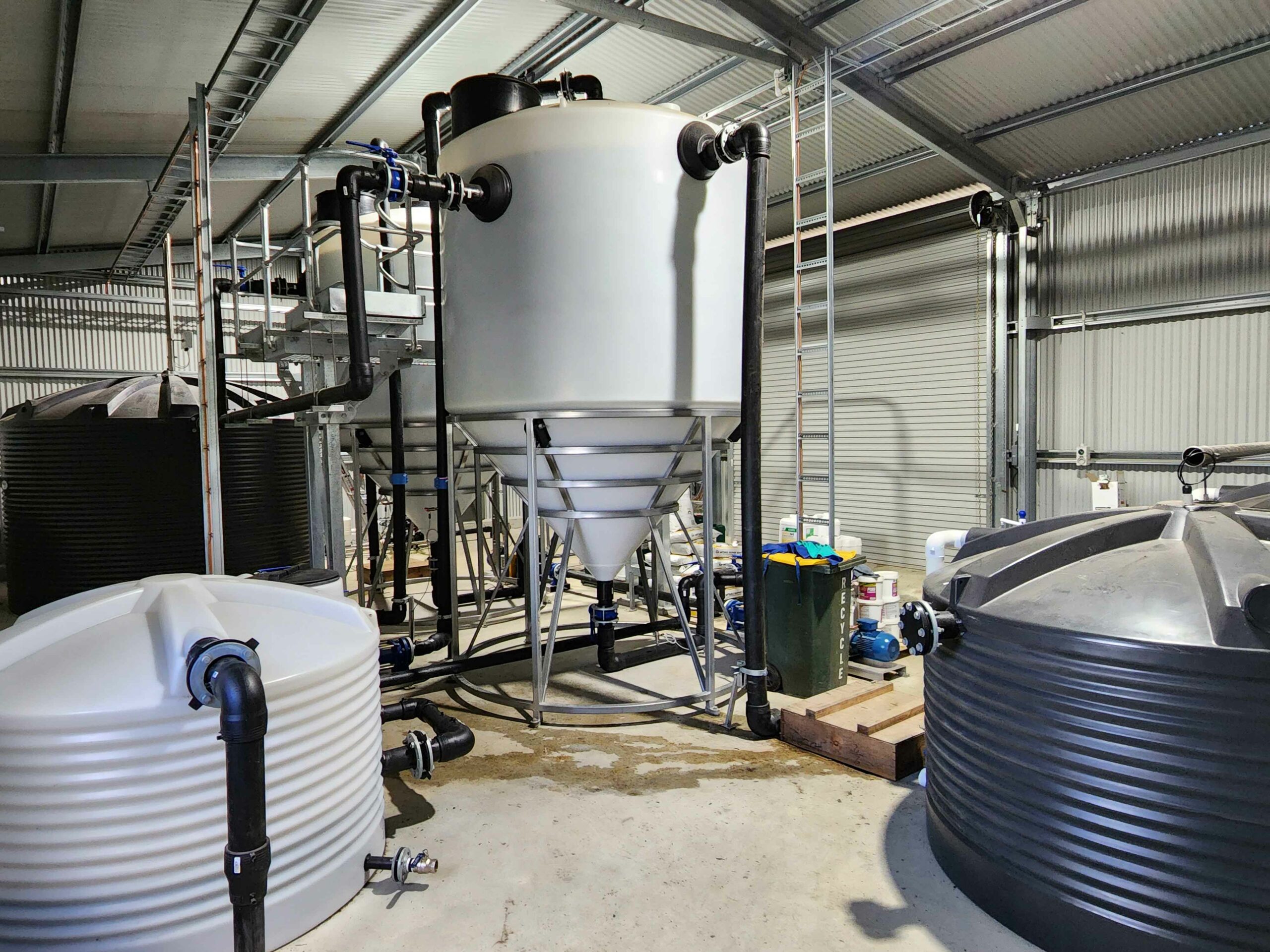bird in the hand winery cone bottom sludge tanks