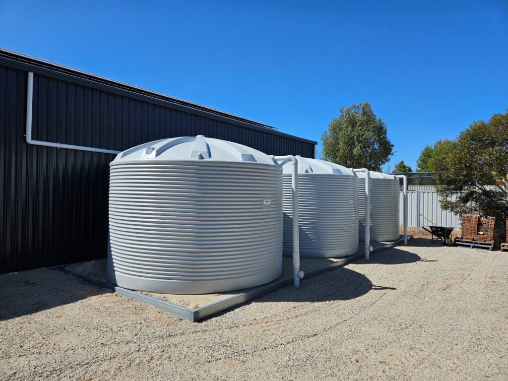 Water tanks beside shed