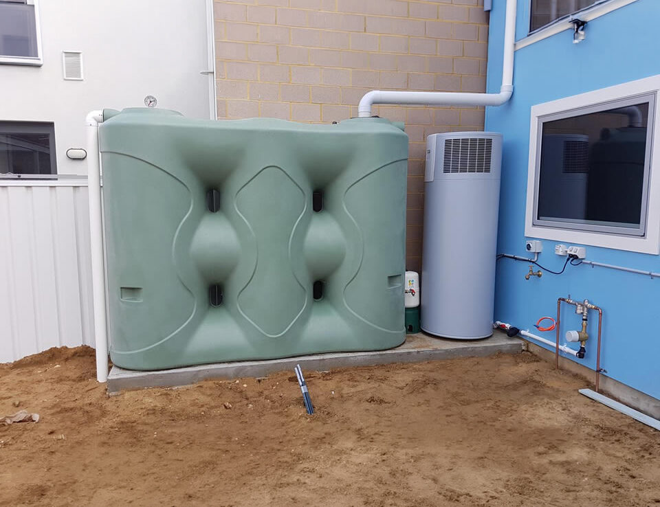Polymaster Slimline water tank in residential courtyard