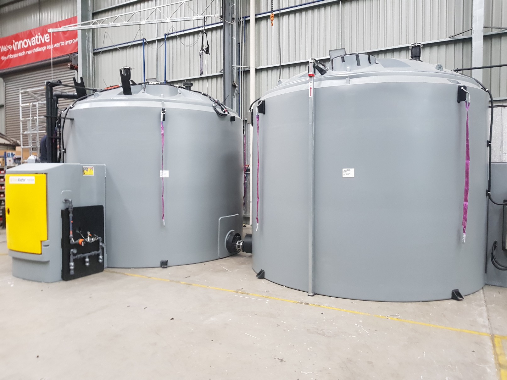 Two self bunded chemical tanks in a warehouse