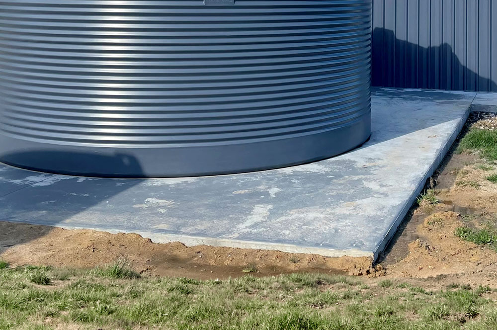 Polymaster water tank concrete base