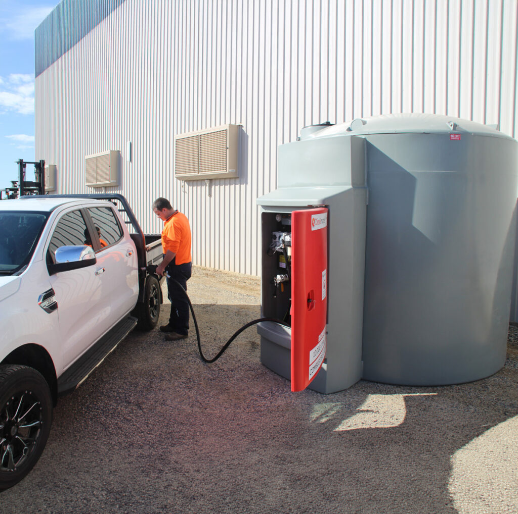 Polymaster Bunded Diesel Tank and dispenser. Man filling car