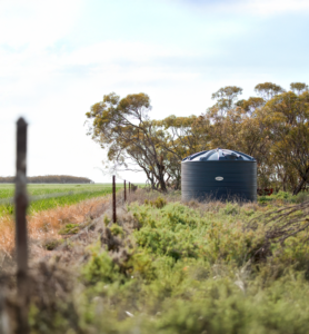 a Polymaster water tank installed in a field