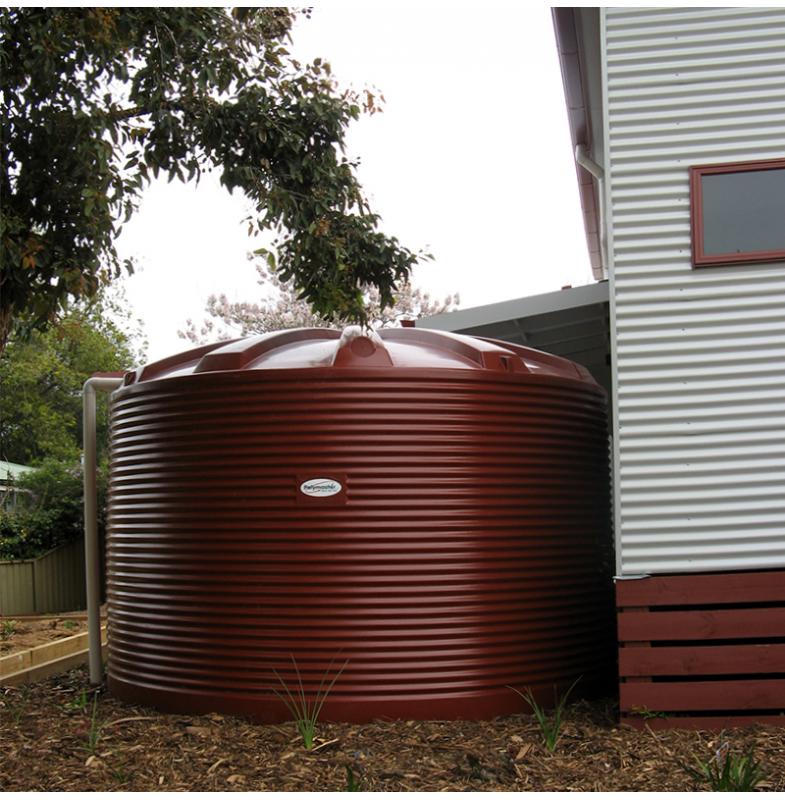 22,500L Water Tank installed beside a residential home