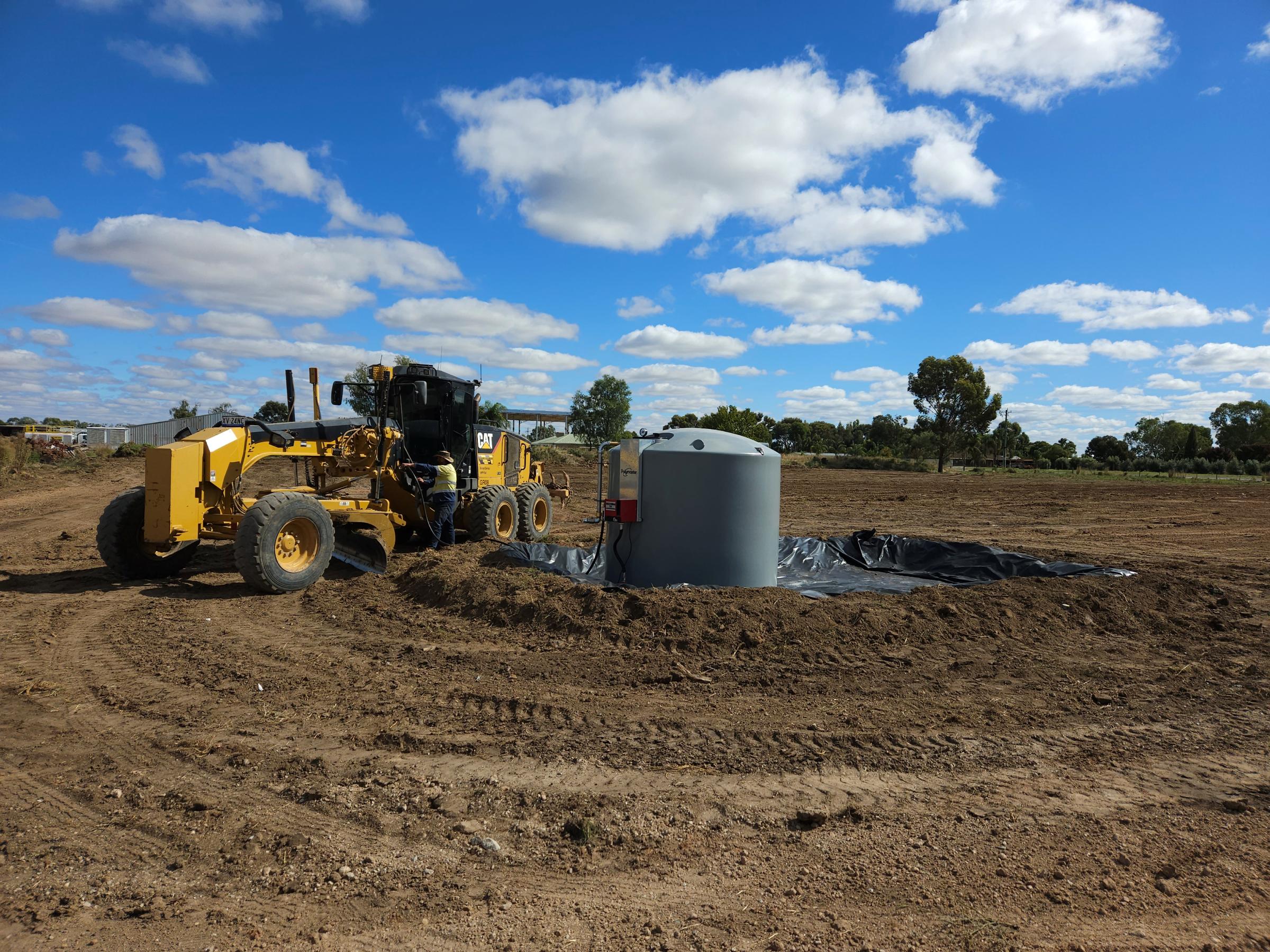 single wall diesel tank filling up grader
